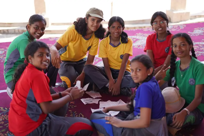 Mysuru ADDA field moment 1 — students mid-activity during an outdoor program