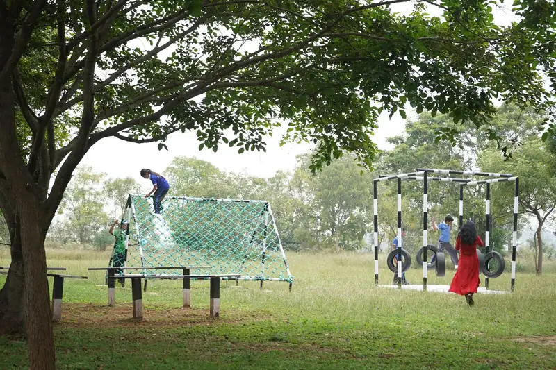 Mysuru ADDA field moment 3 — students mid-activity during an outdoor program