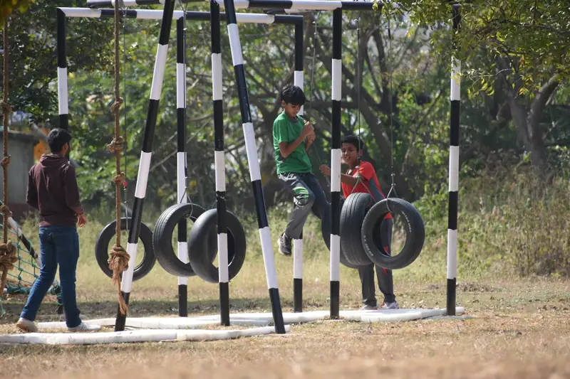 Mysuru ADDA field moment 8 — students mid-activity during an outdoor program