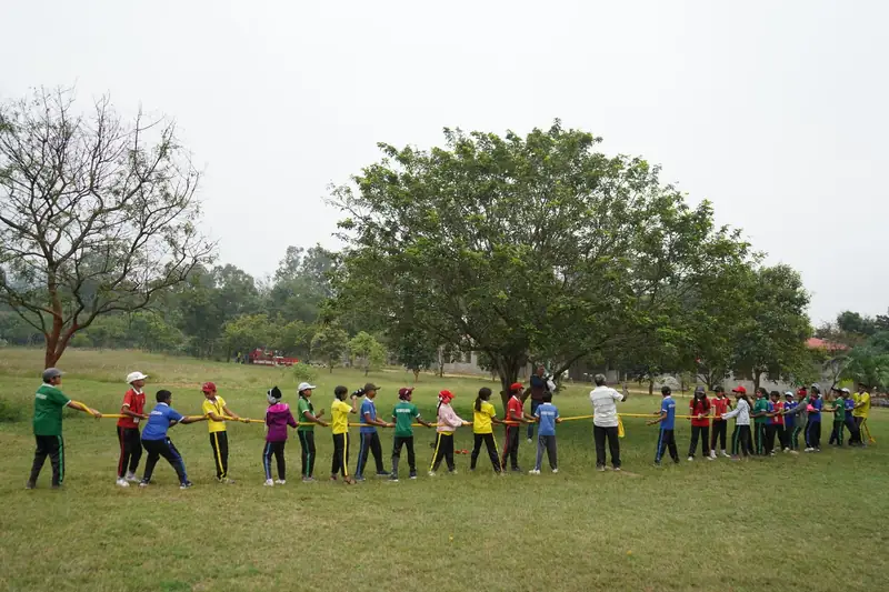 Mysuru ADDA field moment 9 — students mid-activity during an outdoor program
