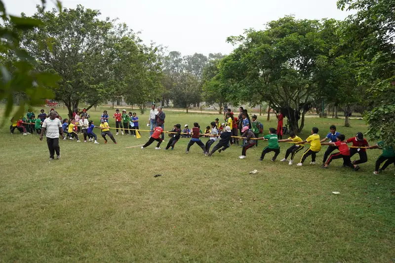 Mysuru ADDA field moment 11 — students mid-activity during an outdoor program