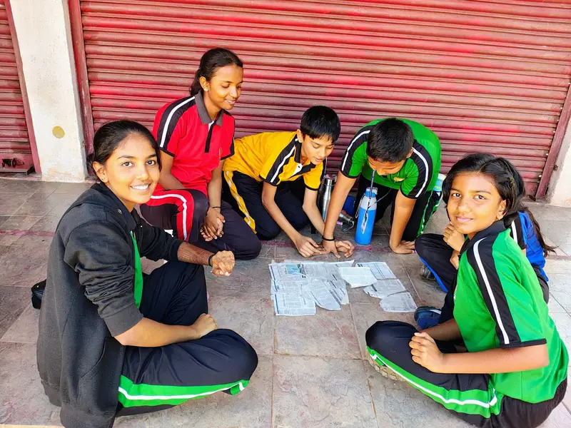Mysuru ADDA field moment 12 — students mid-activity during an outdoor program